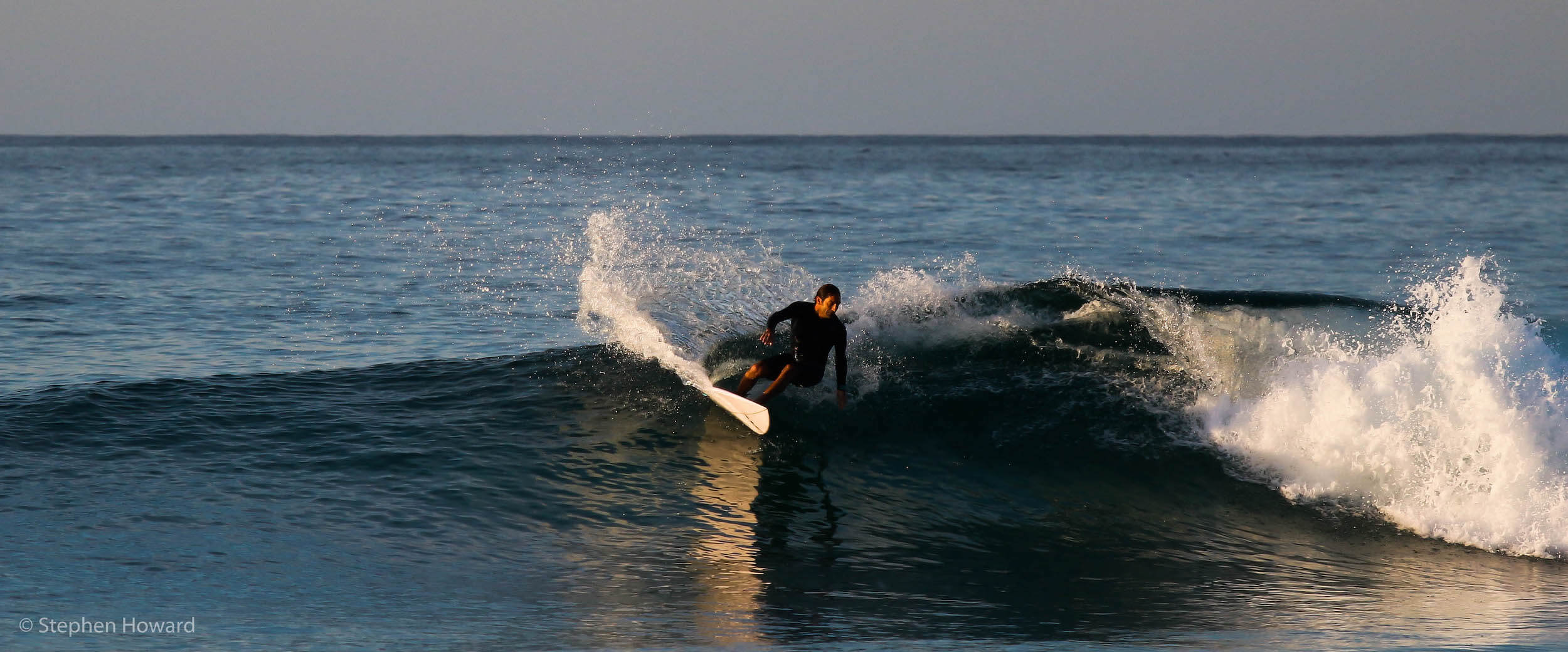 Mike Psillakis surfing a Quad fish handshaped